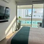 Tres habitaciones - Vista al Mar