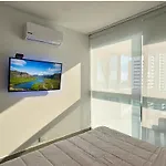 Tres habitaciones - Vista al Mar